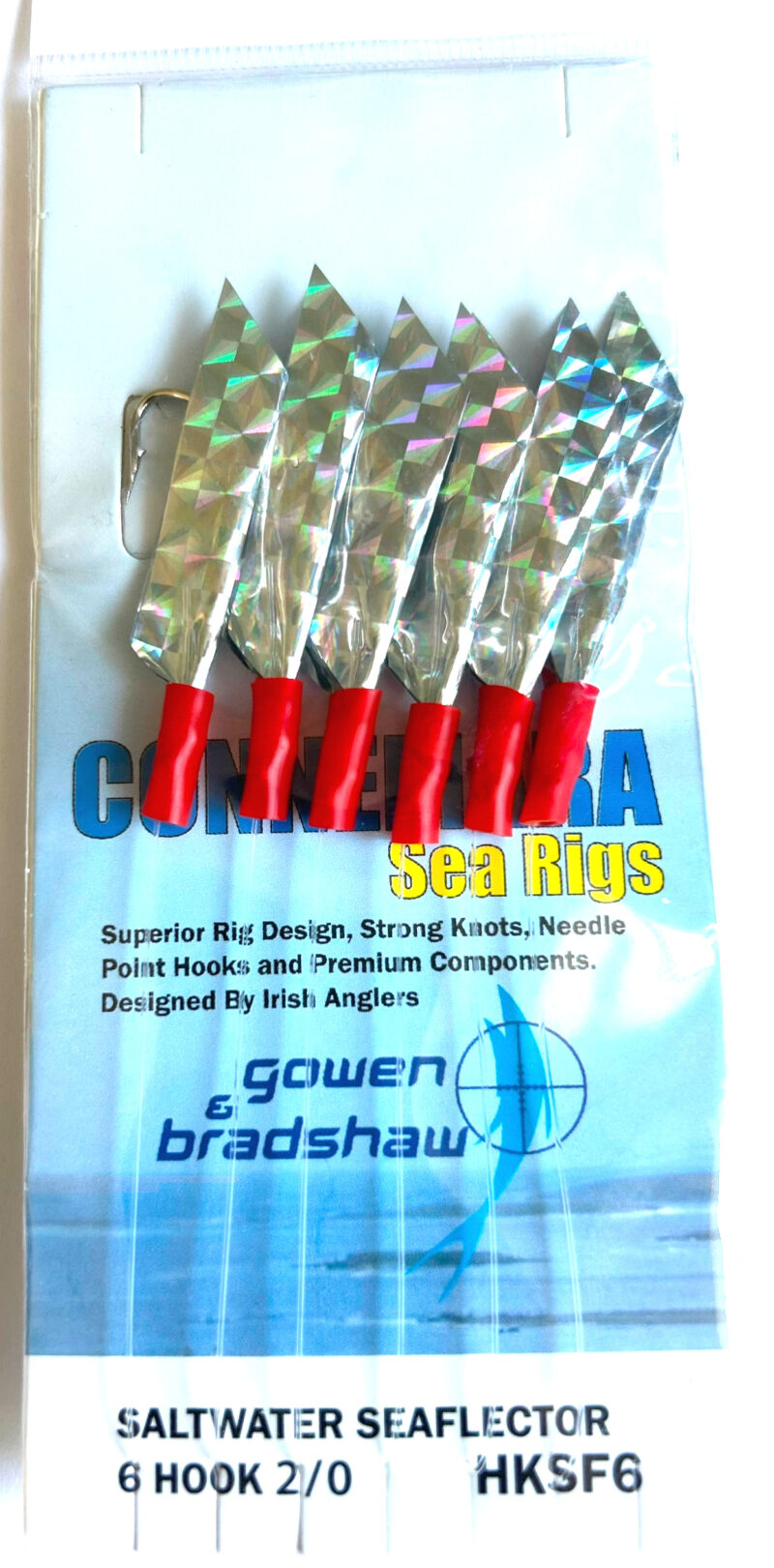 gowen-sea-flector-mackerel - freddiethepillowandfriends.co.uk Six reflective foil sea rigs with red handles arranged in a row inside a package labeled Saltwater Seaflector.